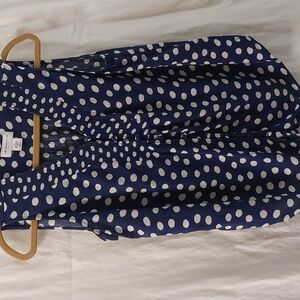Liz Claiborne V-neck Sleeveless polka dot. Front button down round hem. Size PL